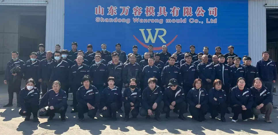 Wanrong Mold team in front of the plant building